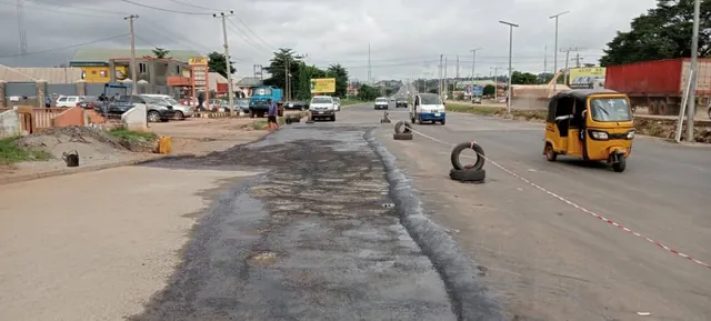 Road construction in Anambra State: failed road surface before works